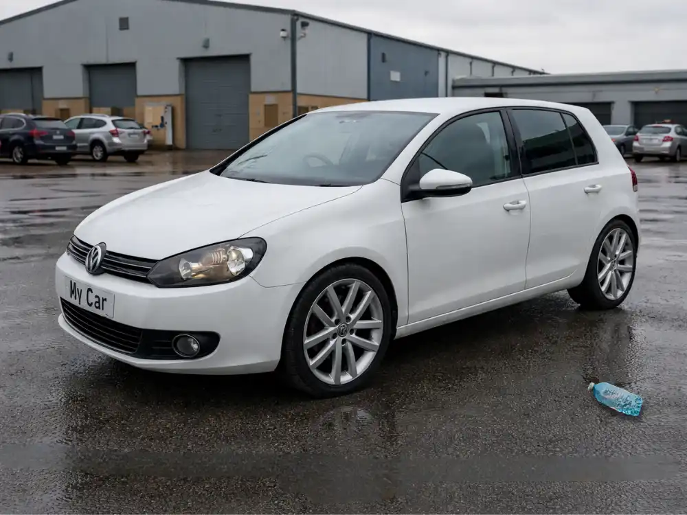 Car photo taken in an ordinary location before showroom background editing